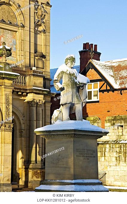 England, North Yorkshire, York, Snow on the statue of York artist William Etty, erected in 1911, outside the York Art Gallery City Art Gallery in winter