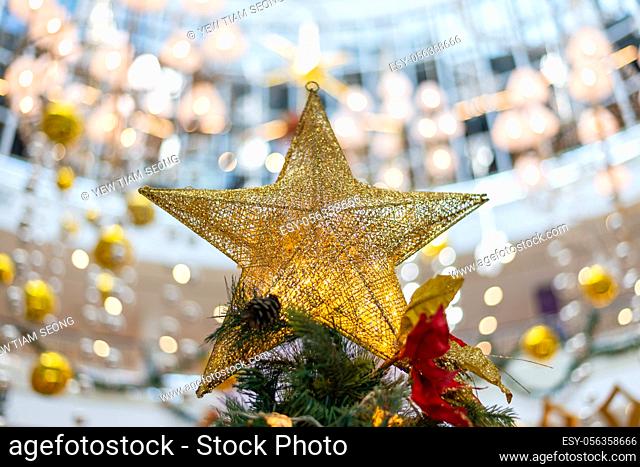 Selective focus christmas star decoration with led background in daylight