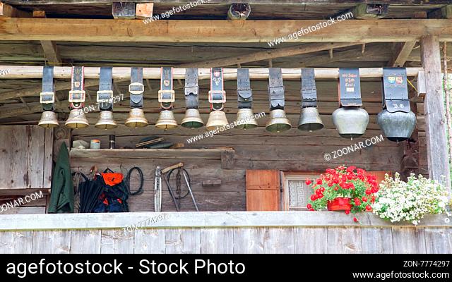 Swiss cowbells hanging at an farm in the Alps