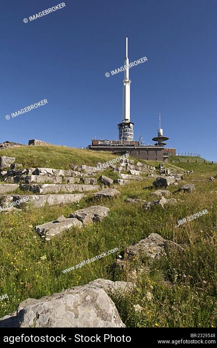Gallo-Roman temple of Mercury with observatory behind meterological observatory on summit of Puy de Dome, Auvergne Volcanoes Regional Nature Park, France