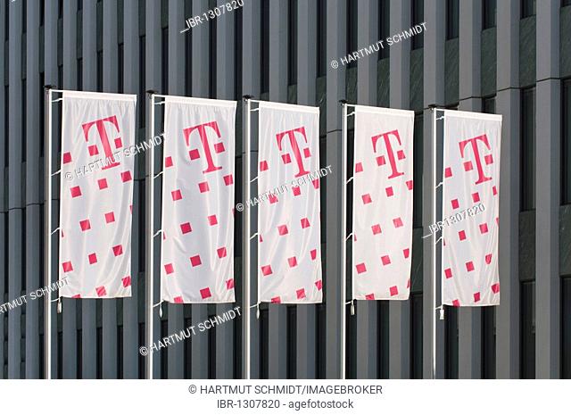 Five Telekom flags in front of an office building facade, Deutsche Telekom AG, Bonn, North Rhine-Westphalia, Germany, Europe