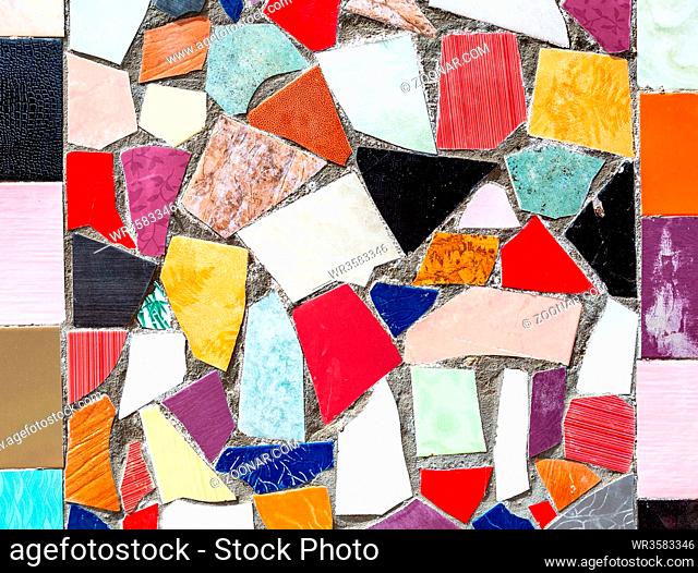 Abstract multicolored mosaic texture of broken ceramic tiles as a creative background