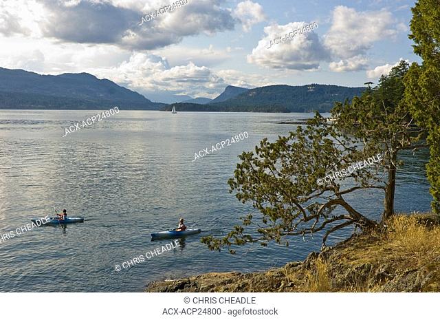 Kayakers at Portland Island, Princess Margaret Park, Gulf Islands, BC, Canada