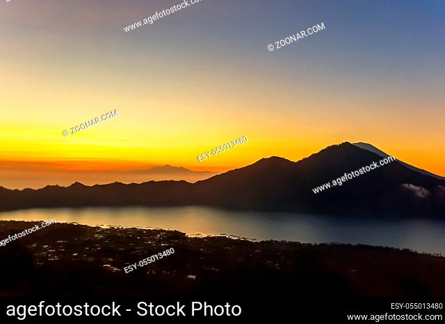 Amazing panorama view on sunrise and mountain from summit of Batur volcano, Bali, Indonesia