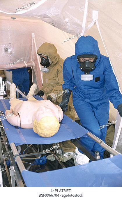 EMERGENCY MEDICAL SERVICE<BR>Reconstructed scene.<BR>Decontamination exercise of EMS : intervention for possible radioactive, nuclear, or bacteria contamination