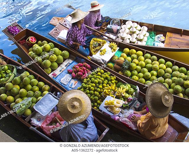 Fruit seller in the Damnoen Saduak floating market, 100 km away from Bangkok Thailand