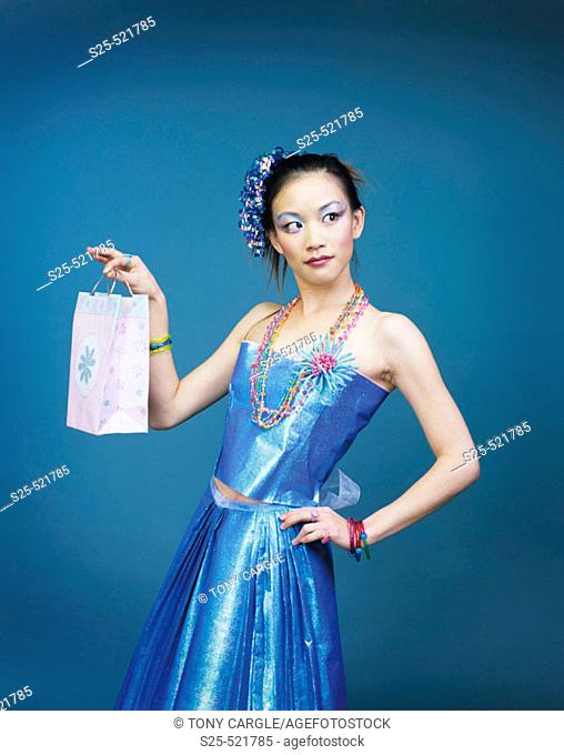 Asian Woman in Skirt & Top made from Wrapping Paper, MR #1056