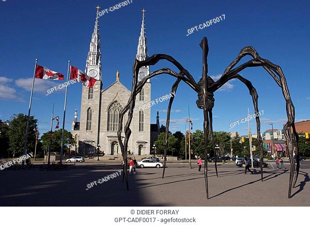 SCULPTURE 'MAMAN' BY LOUISE BOURGEOIS AND CANADIAN FLAGS IN OTTAWA, ONTARIO, CANADA