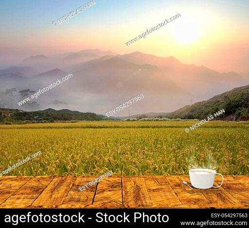 The 3d rendering of wood table in beautiful place with modern office cup with hot coffee in side background