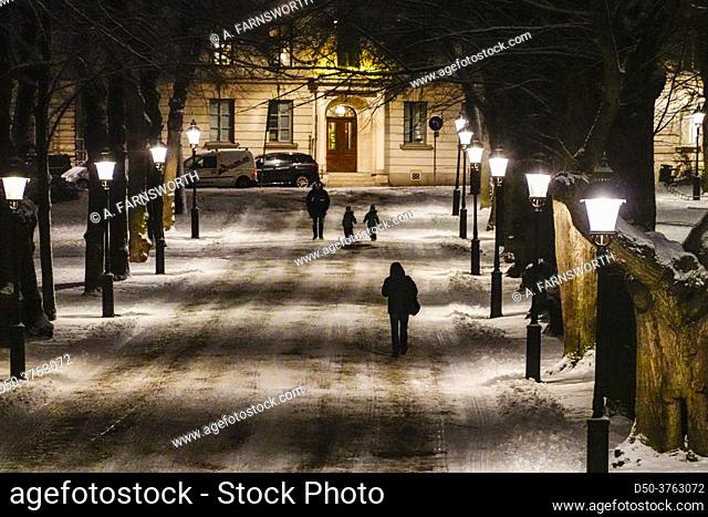 Stockholm, Sweden People walking at night in the Humlegarden park
