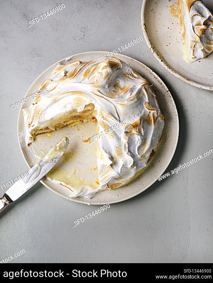 Lemon curd cake topped with meringue