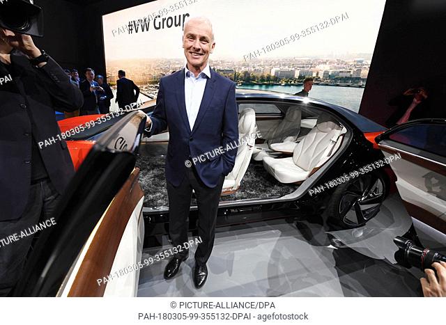 05 March 2018, Switzerland, Geneva: Matthias Mueller, CEO of Volkswagen (VW), presents the VW I.D. Vizzion during the company evening in the run-up to the...