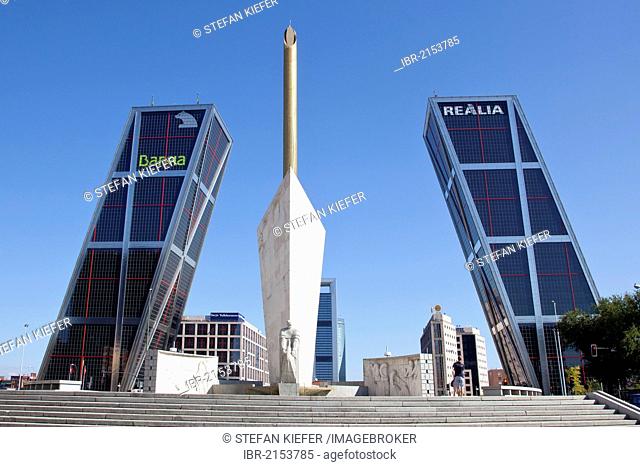 Modern office towers, Puerta de Europa, also called Torres Kio, with the monument to Jose Calvo Sotelo, Plaza Castilla square, Madrid, Spain, Europe