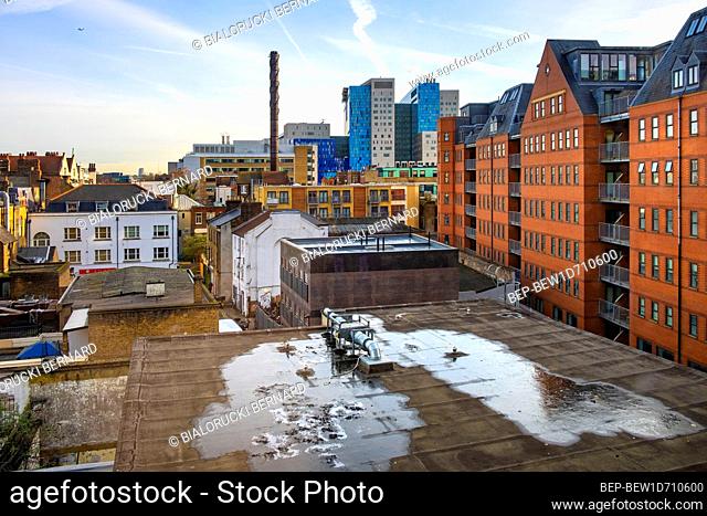 London, England / United Kingdom - 2019/01/29: Panoramic view of the Whitechapel district of East London with fusion of traditional and modernistic architecture...