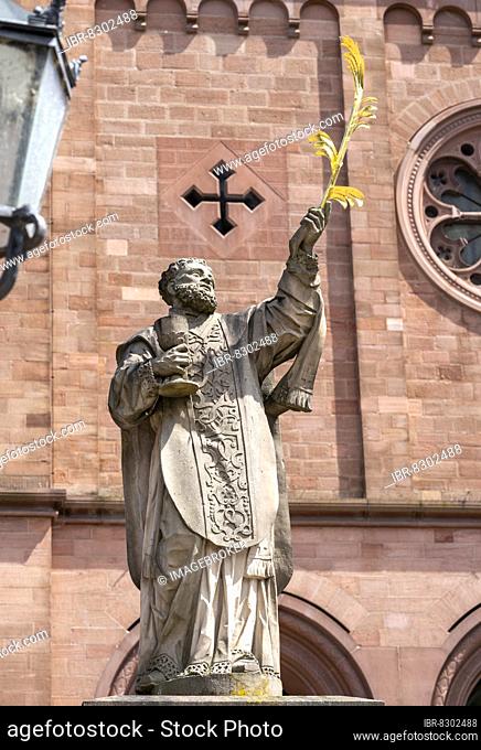 Sculpture of the patron saint Marcellinus in front of the Einhard Basilica of St. Marcellinus and Peter, Seligenstadt, Hesse, Germany, Europe