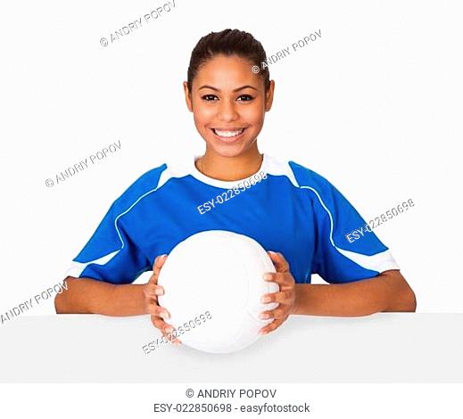 Happy Young Girl Holding Volleyball And Placard
