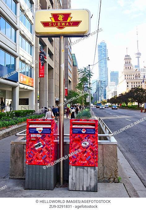 Toronto Subway sign and entrance and Canada Post postboxes (Postes Canada), Toronto, Ontario, Canada