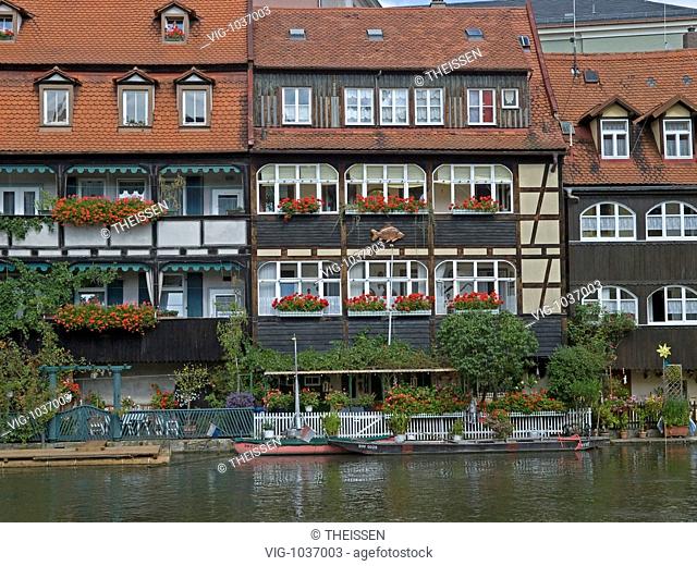 nice old half-timbered fisher houses with gardens and boats at the bank of river Regnitz, Little Venice, Bamberg, Unesco 1993, Bavaria, Upper Franconia, Germany