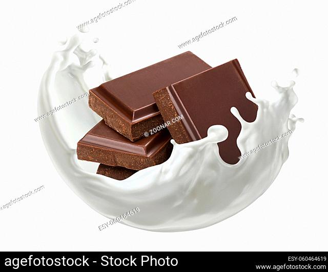 Pieces of chocolate bar with milk splash isolated on white background with clipping path