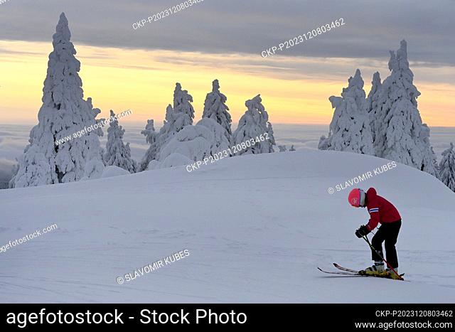 The first skiers on the top of Klinovec (1, 244 m) in the Klinovec ski resort, Karlovy Vary Region, Czech Republic, December 8, 2023