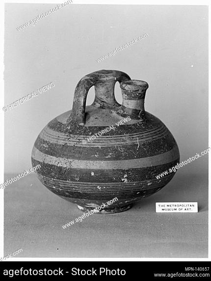 Terracotta stirrup jar. Period: Late Helladic IIIA; Date: ca. 1400-1300 B.C; Culture: Helladic, Mycenaean; Medium: Terracotta; Dimensions: H