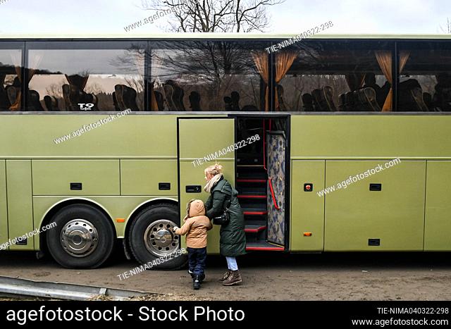 A steady stream of thousands of refugees is also reaching the Polish city of Korzcowa, just across the border. The buses are mainly used to take women and their...
