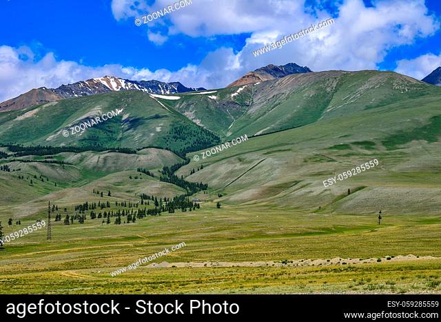 North-Chuya ridge or Severo-Chuiskii range - chain of mountains in Altai republic, Russia - summer mountain landscape with Chuya steppe at foreground