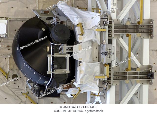 A new Control Moment Gyroscope (CMG) sits in its cradle in the payload bay of the Space Shuttle Discovery prior to its installation on the International Space...