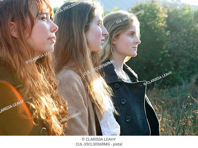 Teenage girls standing outdoors
