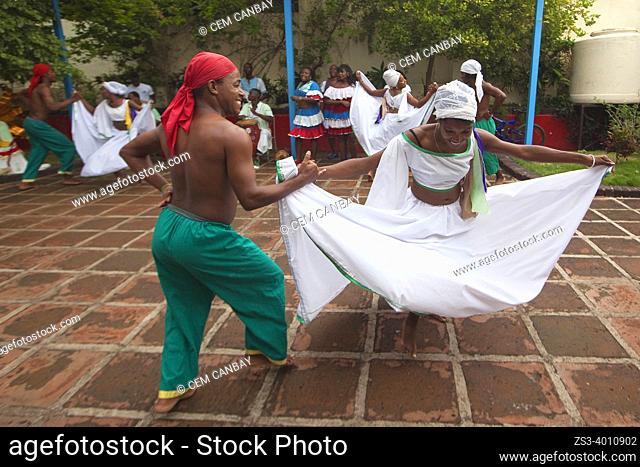 Dancers in traditional dress during a performance at Casa De La Trova in the city center, Santiago De Cuba, Cuba, Central America
