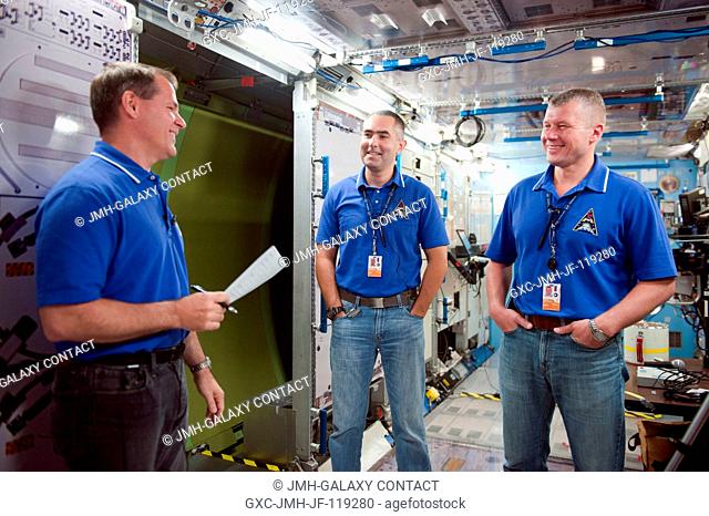 NASA astronaut Kevin Ford (left), Expedition 33 flight engineer and Expedition 34 commander; along with Russian cosmonauts Evgeny Tarelkin (center) and Oleg...