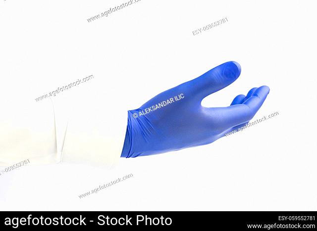 Doctor wearing blue latex Glove. Opened hand. White background. Copy space