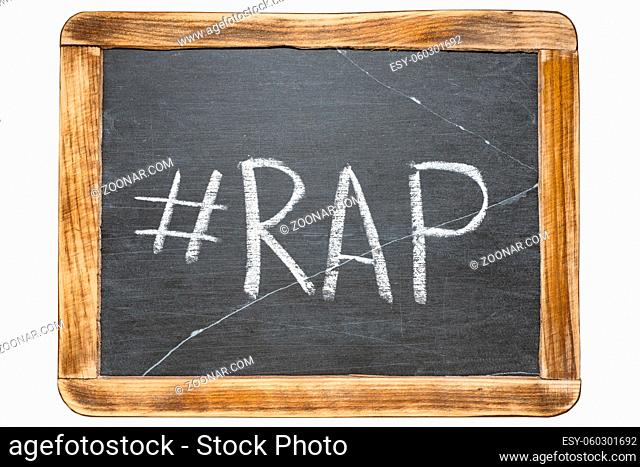 rap hashtag handwritten on vintage school slate board isolated on white