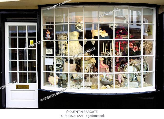 England, North Yorkshire, York. The window display of Rosie Muggles, a fashion shop in Stonegate