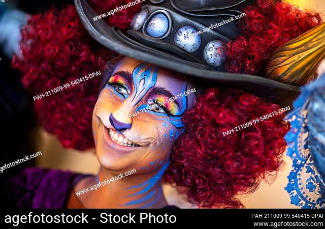 09 October 2021, Mecklenburg-Western Pomerania, Boltenhagen: Maribel Heinzelmann prepares as an elaborately made-up fable figure for her appearance in the spa...
