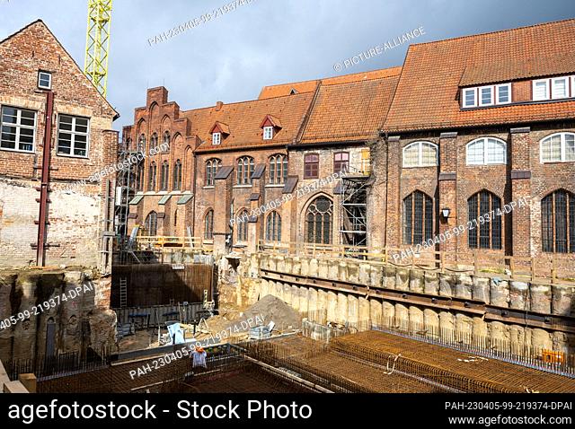 PRODUCTION - 31 March 2023, Mecklenburg-Western Pomerania, Stralsund: Workers work on the new foundation at the construction site of the Oceanographic Museum