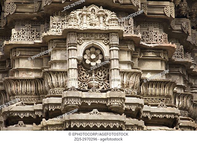 Carving details on the outer wall of Jhulta Minara, Ahmedabad, Gujarat, India