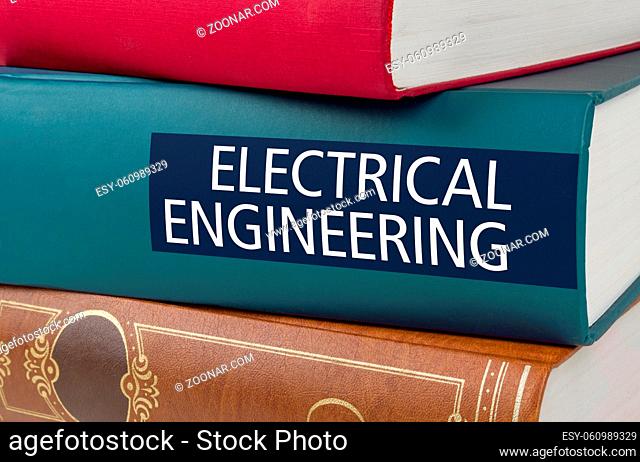 A book with the title Electrical Engeneering written on the spine