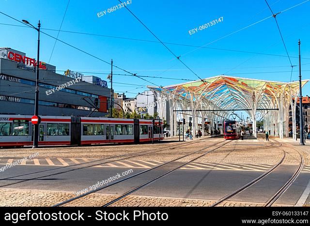 Lodz, Poland - September 9, 2021: trams arrive at the modern main tram station in downtown Lodz