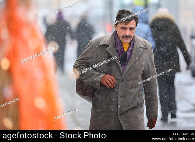 RUSSIA, MOSCOW - DECEMBER 10, 2023: A man walks in Bolshaya Nikitskaya Street. Sofya Sandurskaya/TASS
