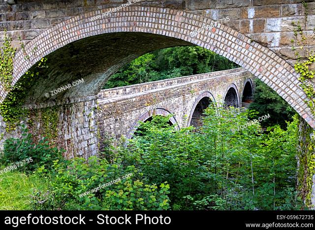 BERWYN, DENBIGHSHIRE, WALES - JULY 11 : Old stone bridges in Berwyn, Wales on July 11, 2021