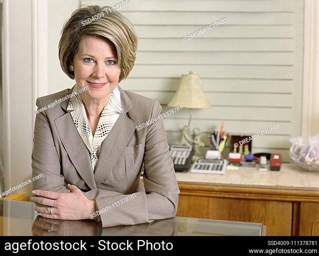 Middle-aged businesswoman smiling for the camera