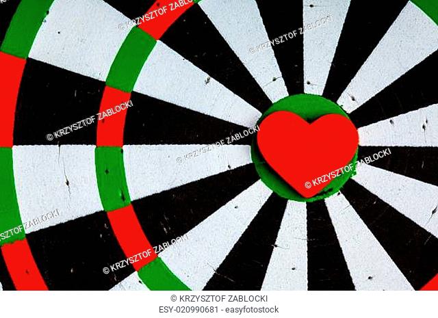 Closeup black white target with heart bullseye as love background