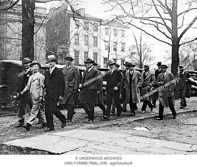 Washington, D.C.: April 10, 1928. The jury members of the Teapot Dome Trial trying oilman Harry Sinclair for fraud are escorted by U.S