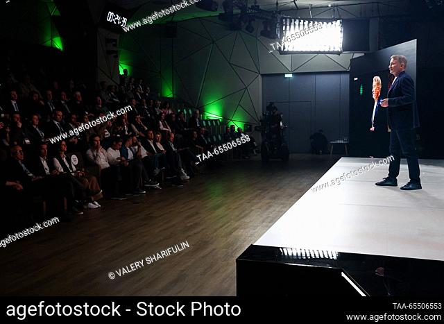 RUSSIA, MOSCOW - DECEMBER 6, 2023: Sberbank CEO and Executive Board Chairman Herman Gref (R) is seen during an event marking Investor’s Day at Sber City in...