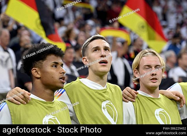 left to right Karim-David ADEYEMI (GER), Nico SCHLOTTERBECK (GER), Julian BRANDT (GER) sing the anthem, substitutes, Spain (ESP) - Germany (GER)