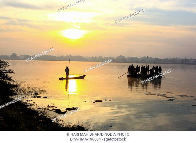 Fishing boat in dalpat sagar lake, jagdalpur, bastar, chhattisgarh, india, asia
