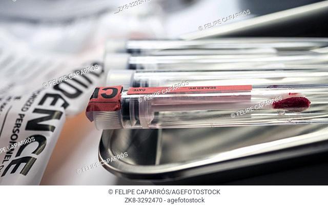 DNA test blood sample, criminalistic laboratory, conceptual image