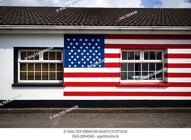 Ireland, County Offaly, Moneygall, house painted with US flags for visit by US President Barack Obama