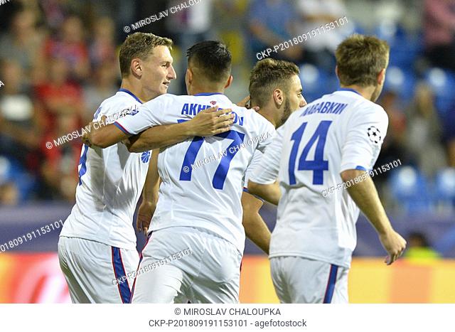 Fyodor Chalov of CSKA, left, with his teammates celebrate the first goal in the 1st round, Group G, Champions League match FC Viktoria Plzen vs CSKA Moscow in...